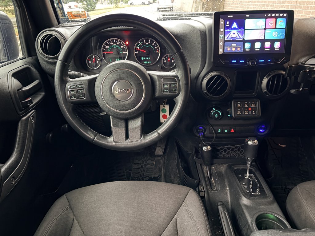 Used 2017 Granite Crystal Metallic Clearcoat Jeep Sport image 15