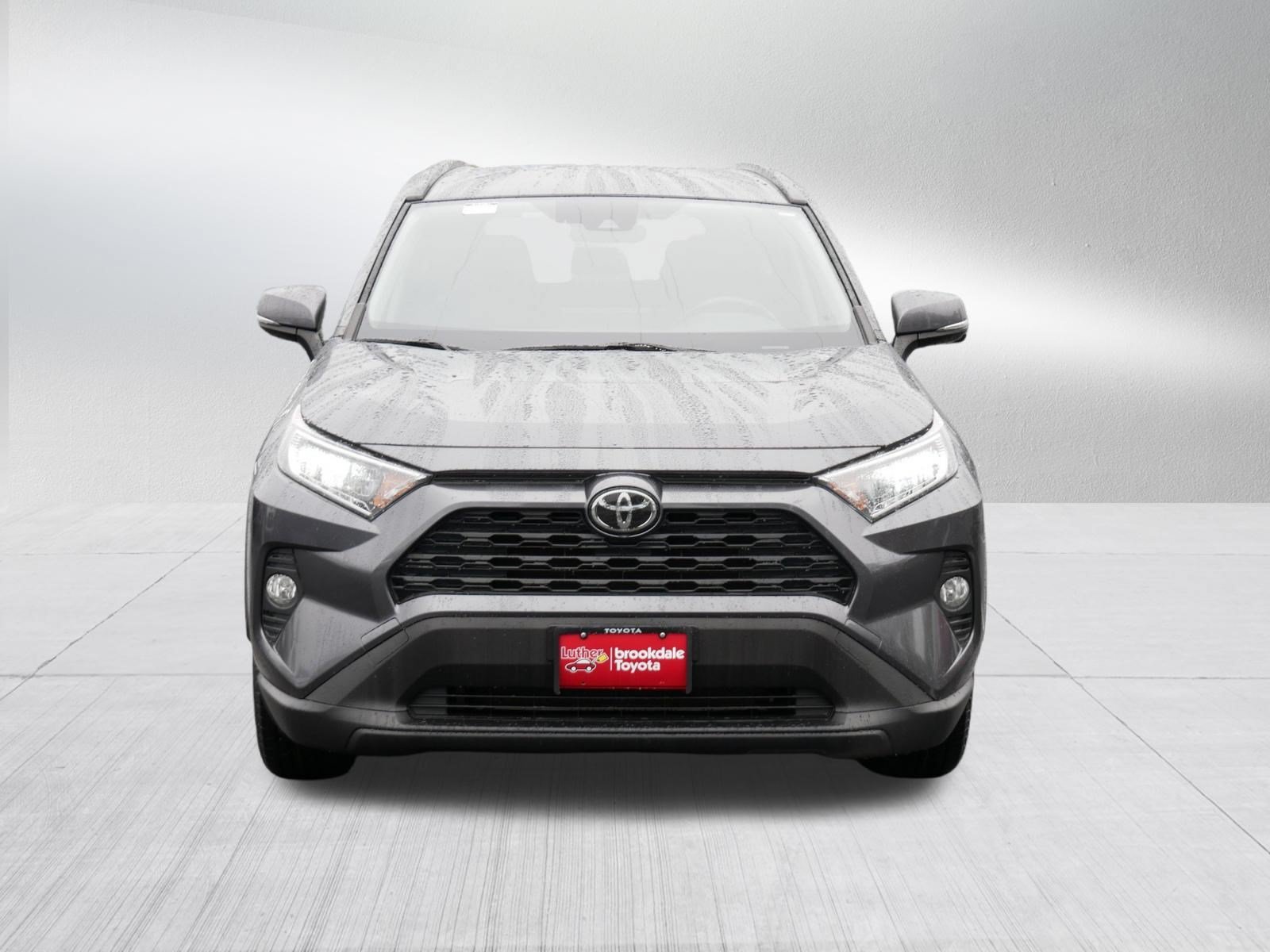 Used 2020 Toyota RAV4 XLE with VIN JTMP1RFV8LD058986 for sale in Brooklyn Center, Minnesota