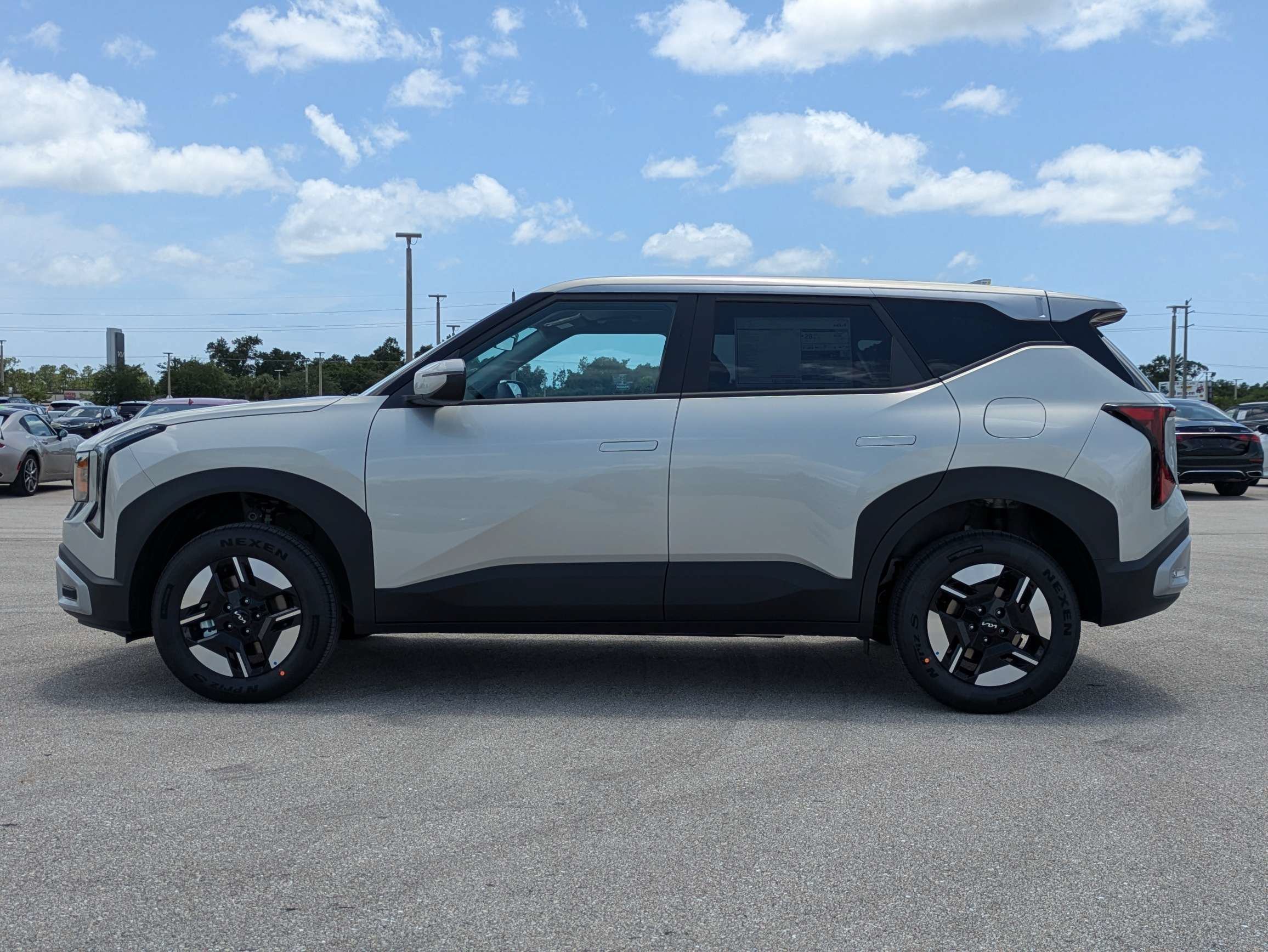 New 2027 Ivory Silver Kia LX image 8
