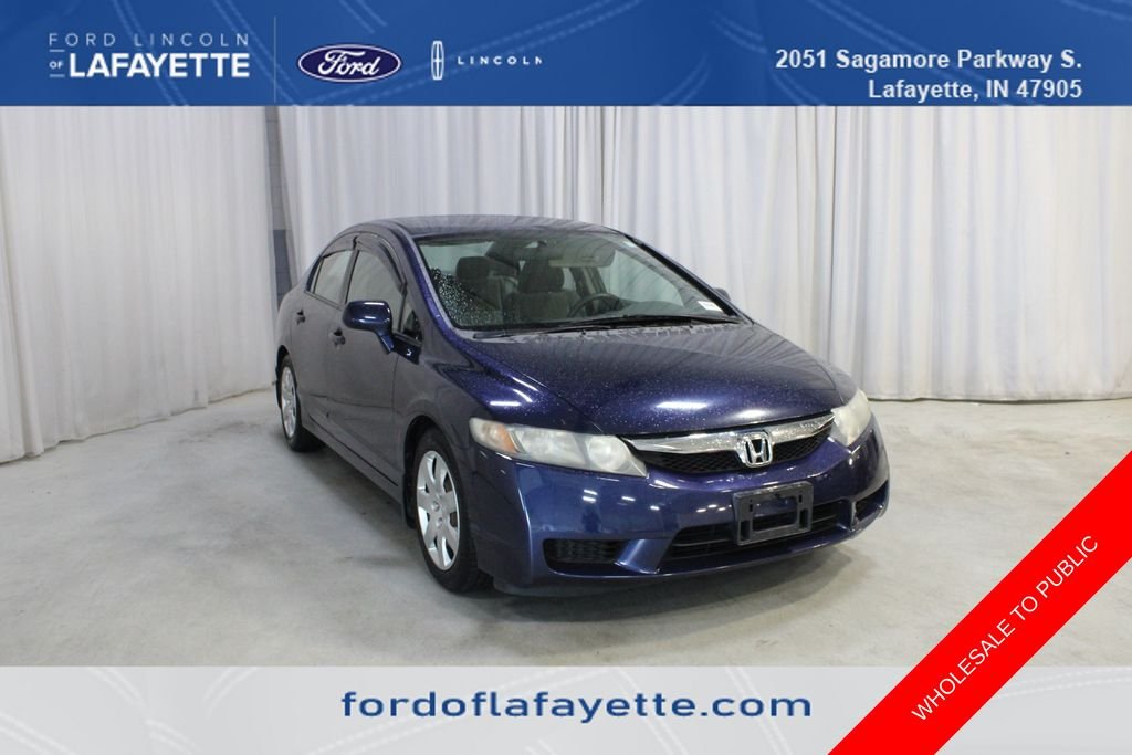 Used 2009 Atomic Blue Metallic Honda LX image 1
