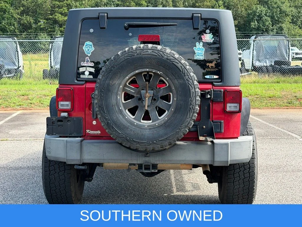 Used 2014 Red Jeep Unlimited Sport image 6