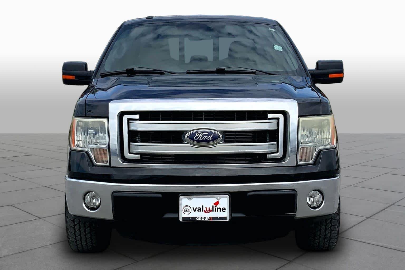 Used 2013 Tuxedo Black Metallic Ford XLT image 4
