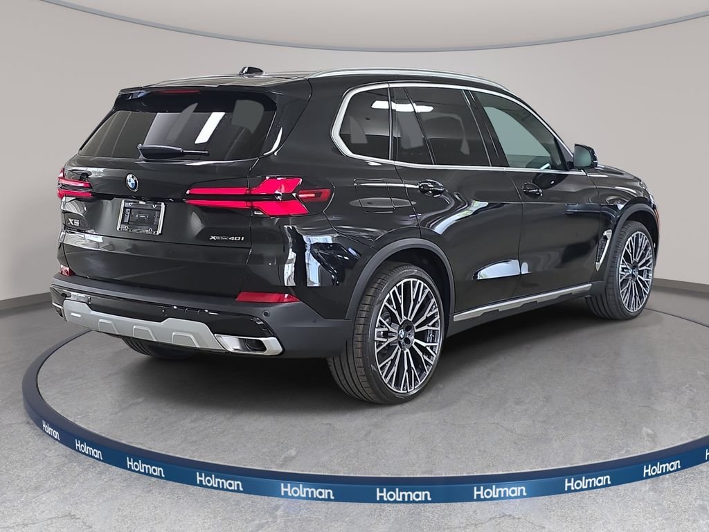 New 2026 Black Sapphire Metallic BMW xDrive40i image 4