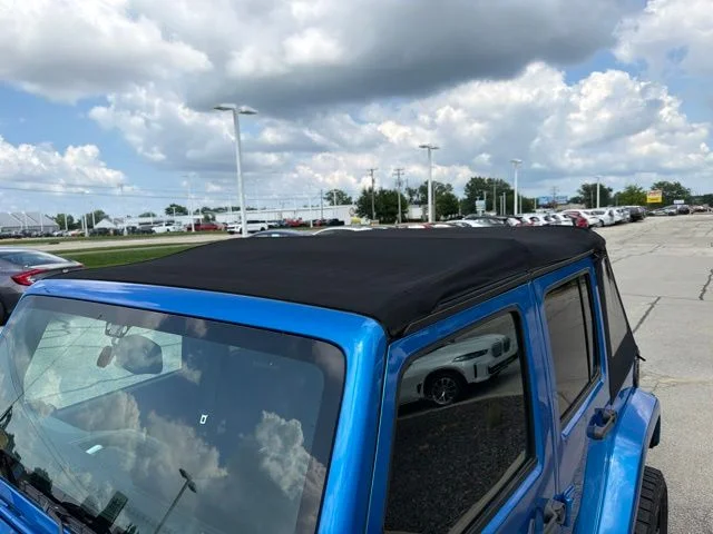 Used 2016 Blue Jeep Unlimited Sahara image 12