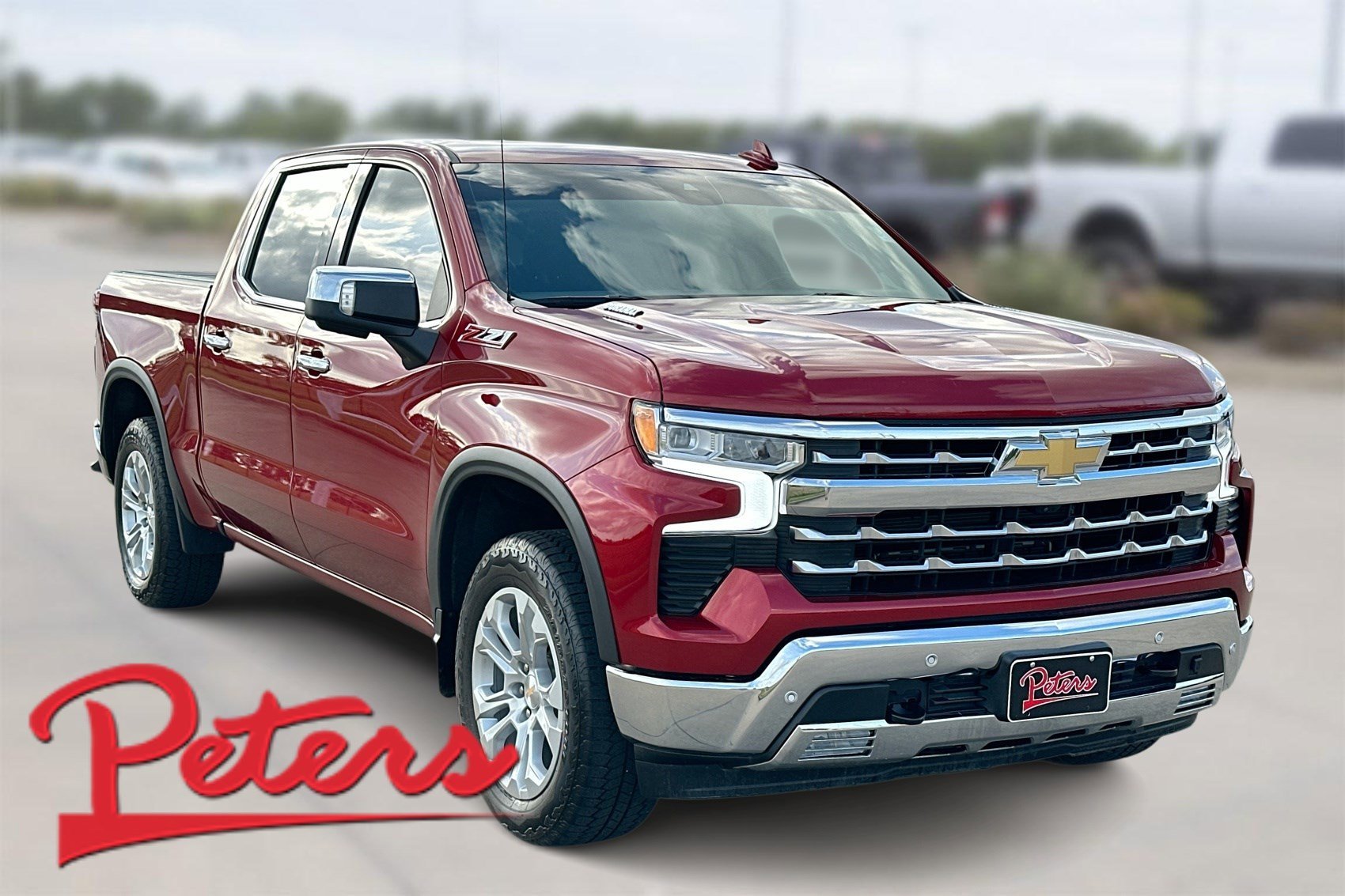Used 2025 Radiant Red Tintcoat Chevrolet LTZ image 1