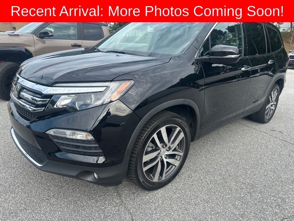 Used 2016 Crystal Black Pearl Honda Elite image 1