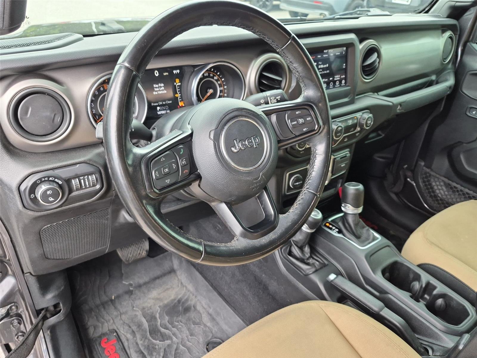 Used 2020 Granite Crystal Metallic Clearcoat Jeep Sport S image 19
