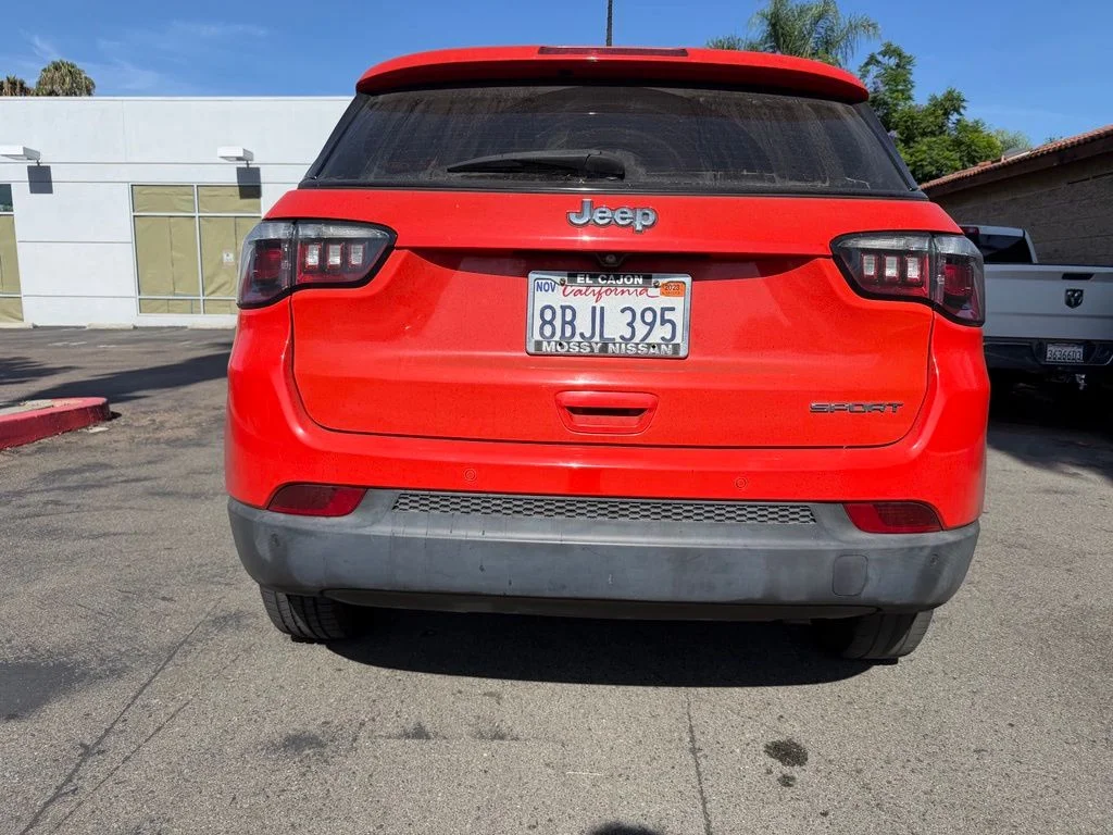 Used 2018 Orange Jeep Sport image 11