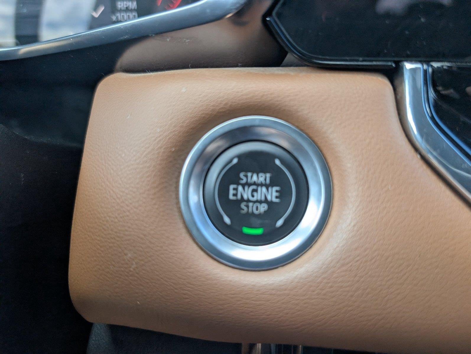 Used 2024 Deep Bronze Metallic GMC AT4 image 24