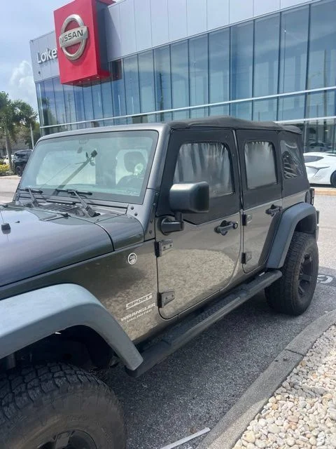 Used 2016 Gray Jeep Unlimited Sport image 2