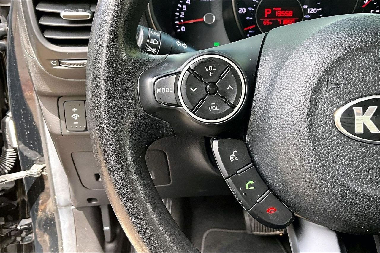 Used 2016 Black Kia Plus image 10