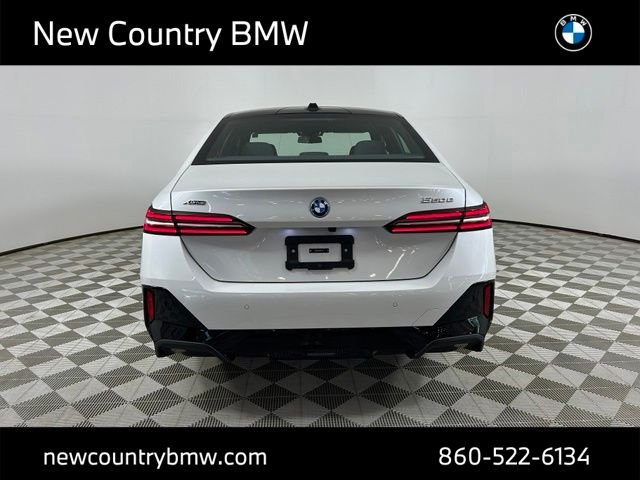 New 2026 Mineral White Metallic BMW 550e xDrive image 6