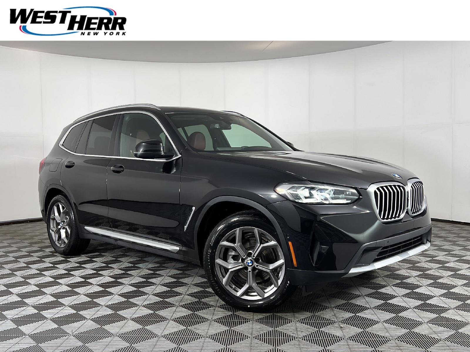 Used 2024 Black Sapphire Metallic BMW xDrive30i image 1