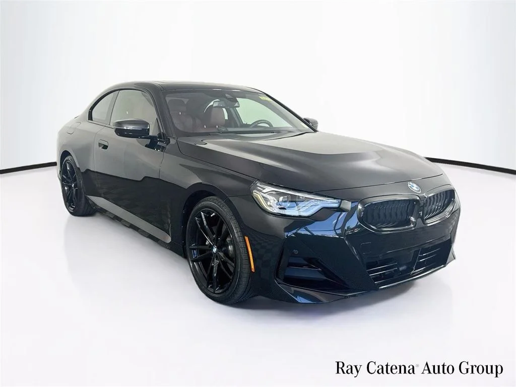 Used 2024 Black BMW 230i xDrive image 1