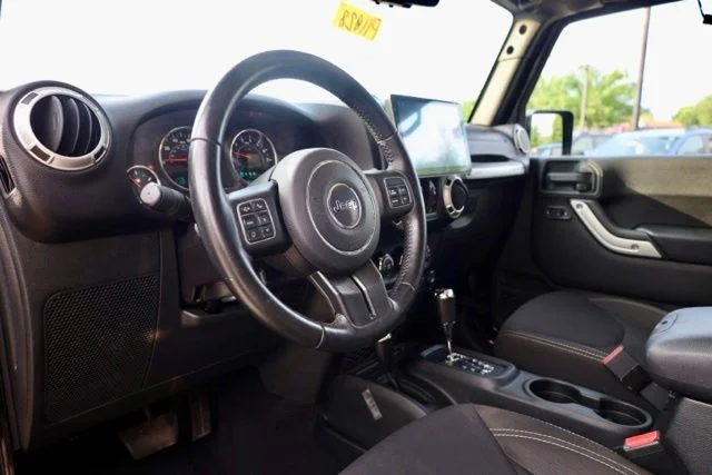 Used 2017 Black Jeep Unlimited Sahara image 17