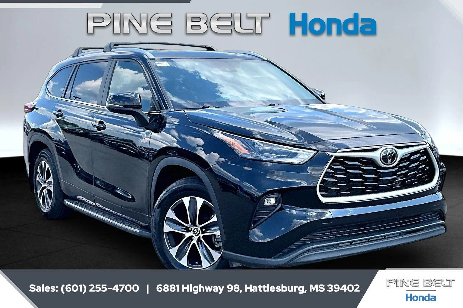 Used 2023 Midnight Black Metallic Toyota XLE image 1