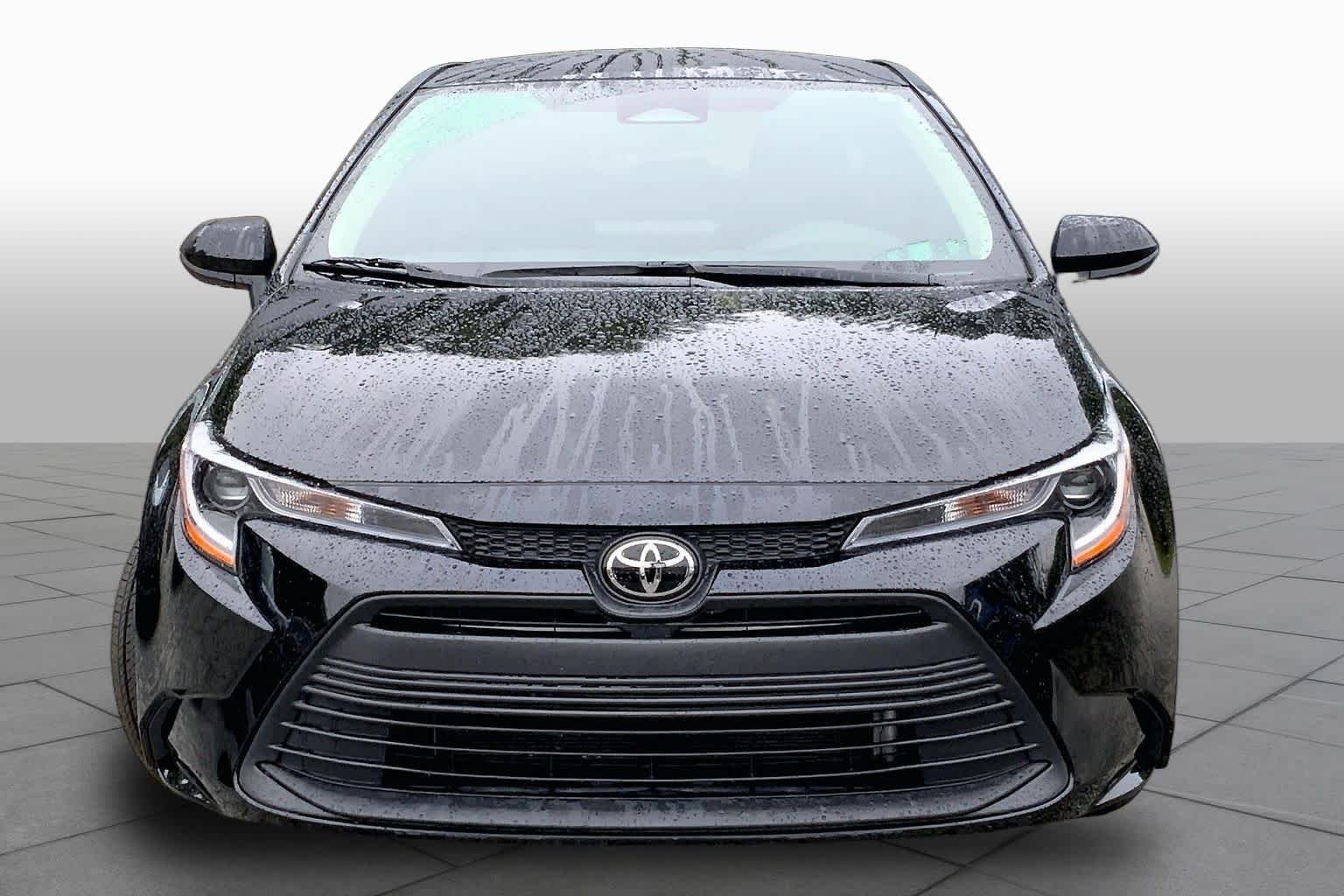 Used 2025 Midnight Black Metallic Toyota LE image 4