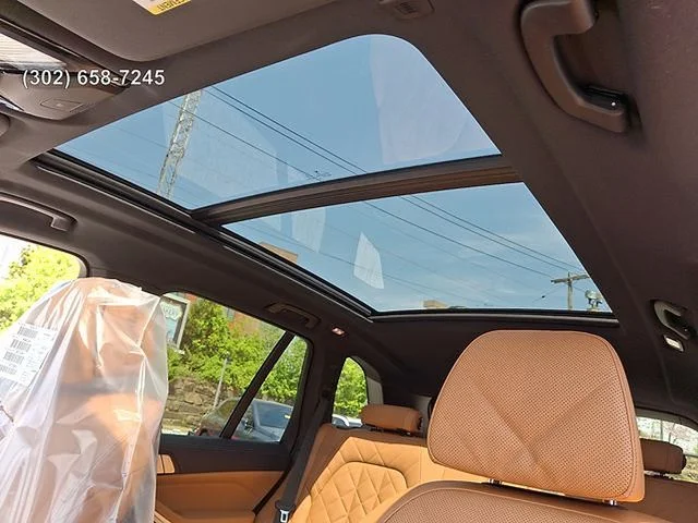 New 2026 Mineral White Metallic BMW xDrive50e image 13