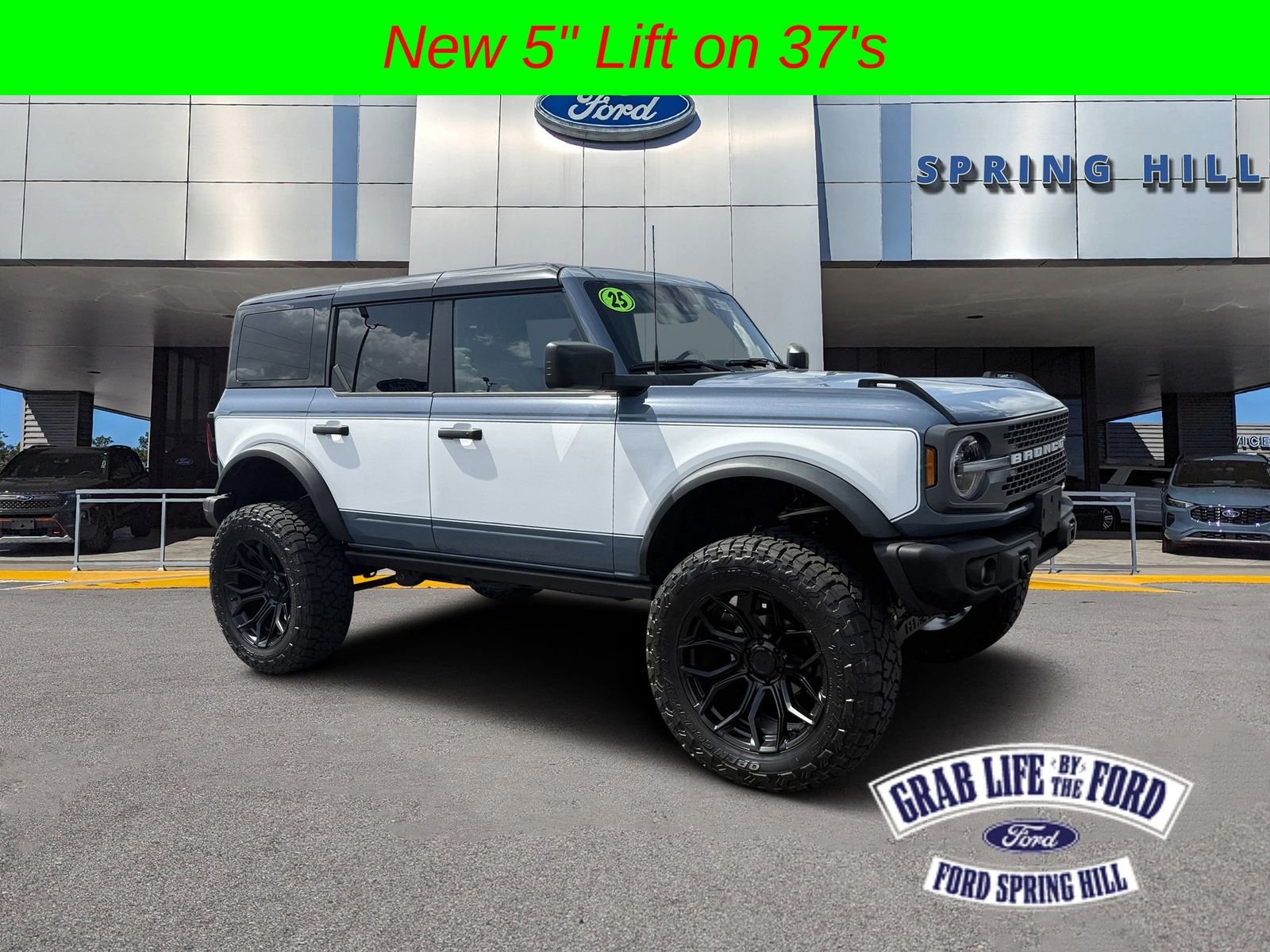 Used 2025 Azure Gray Metallic Ford Badlands image 1