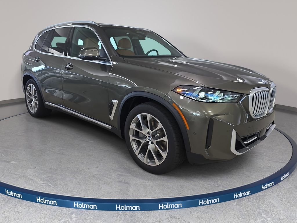 New 2026 Manhattan Green Metallic BMW xDrive50e image 3