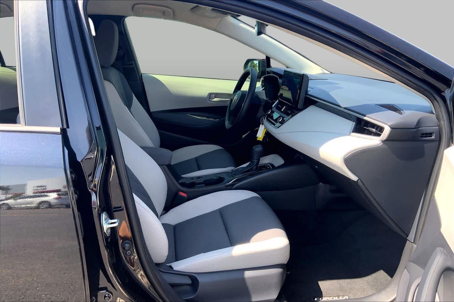 Used 2026 Midnight Black Metallic Toyota Hybrid LE image 9