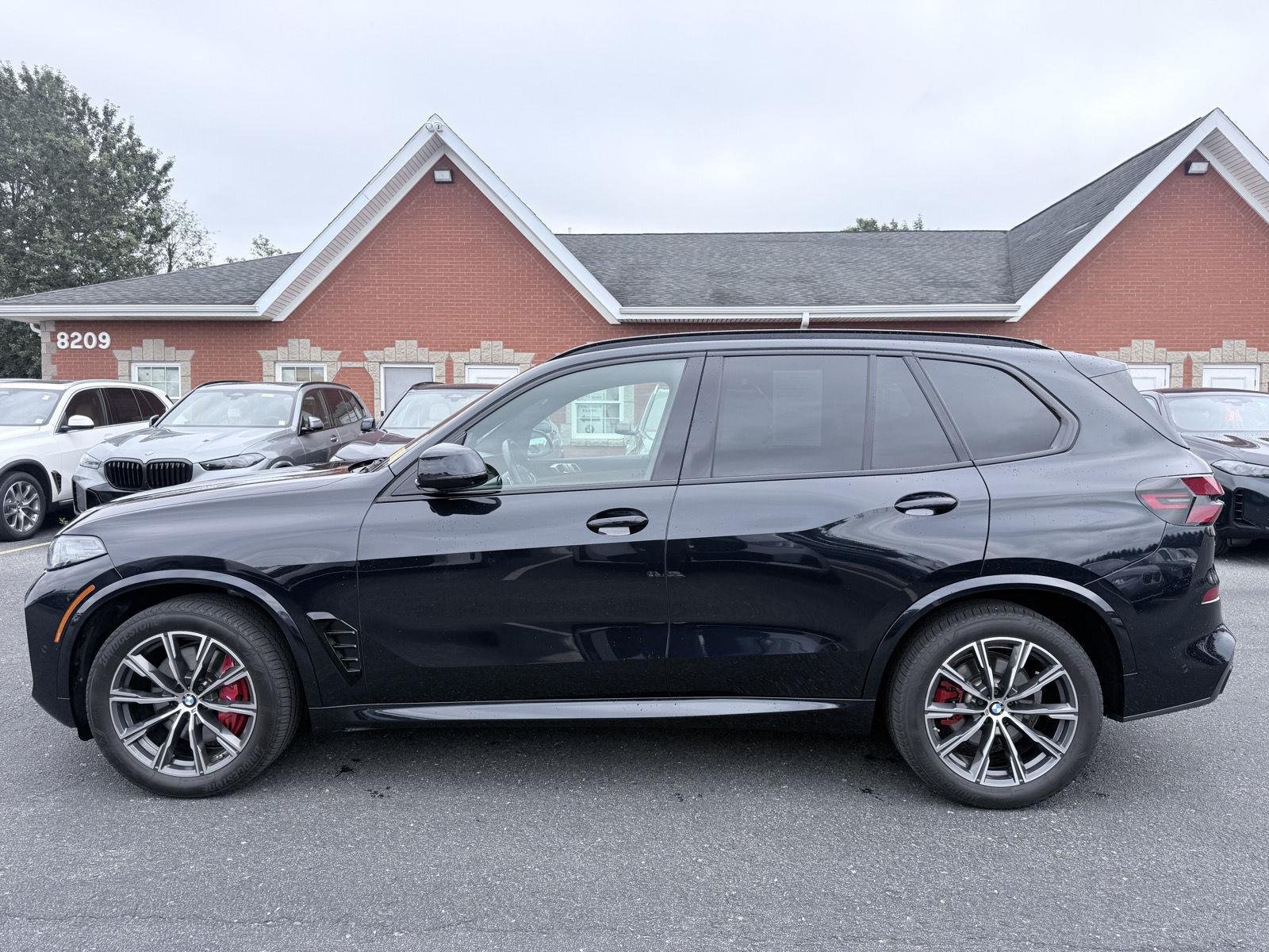 Used 2024 Carbon Black Metallic BMW xDrive40i image 4