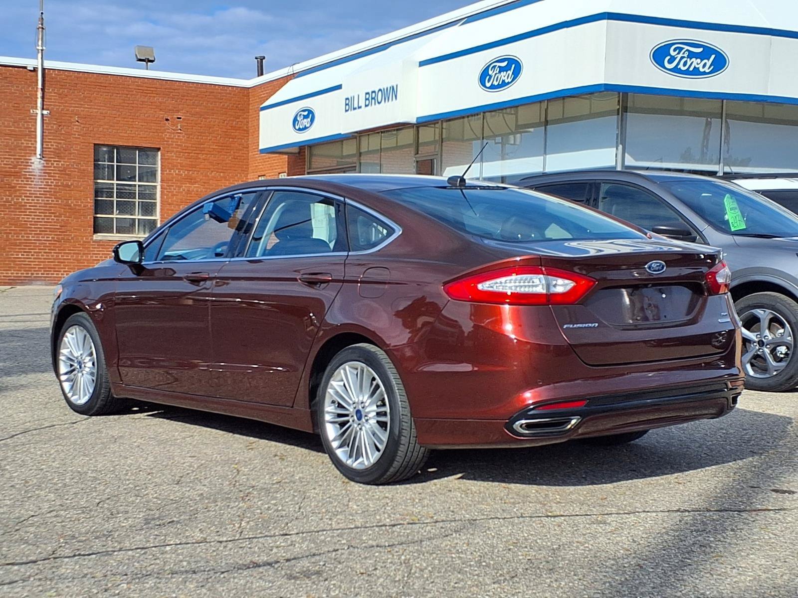 Used 2015 Bronze Fire Metallic Tinted Clearcoat Ford SE image 2