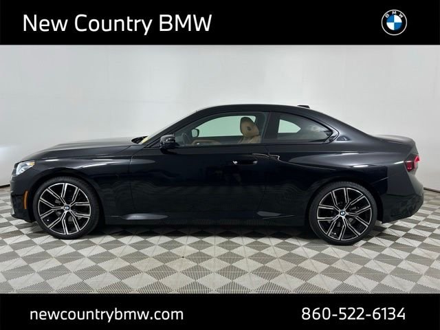 Used 2023 Black Sapphire Metallic BMW 230i xDrive image 4