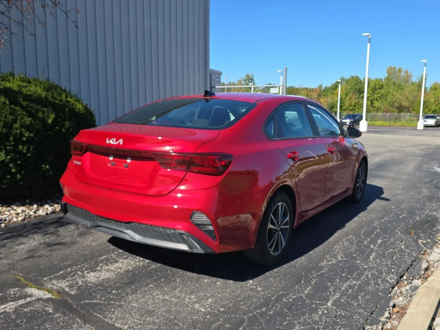 Used 2024 Currant Red Kia LXS image 9