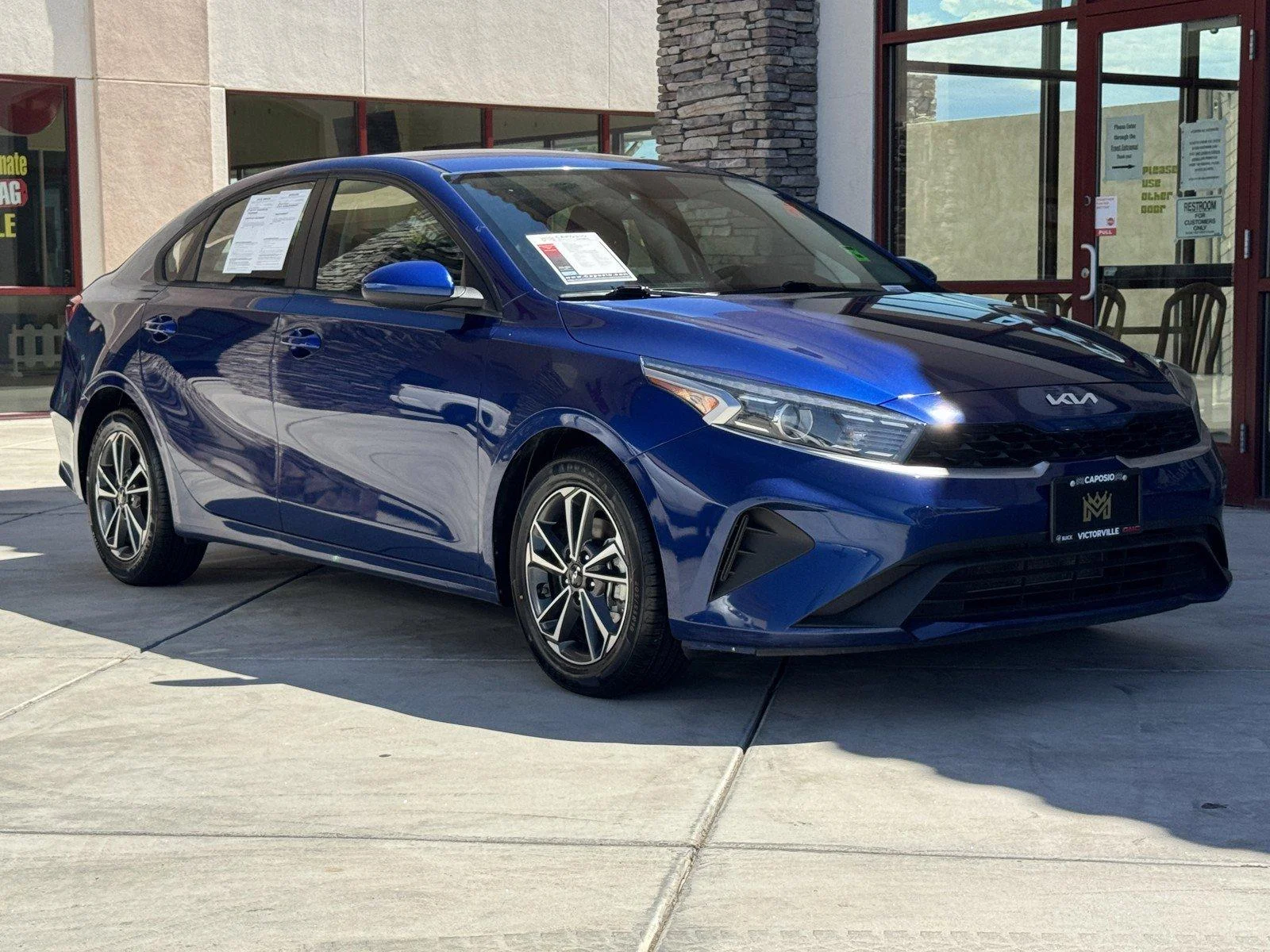 Used 2022 Deep Sea Blue Kia LXS image 1