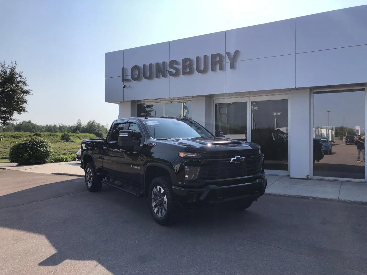 Used 2024 Black Chevrolet 4WD Crew Cab 159" Custom Z71 image 1