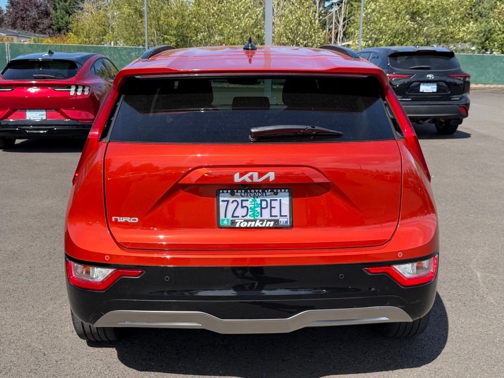 Used 2023 Fire Orange Kia Wind image 6