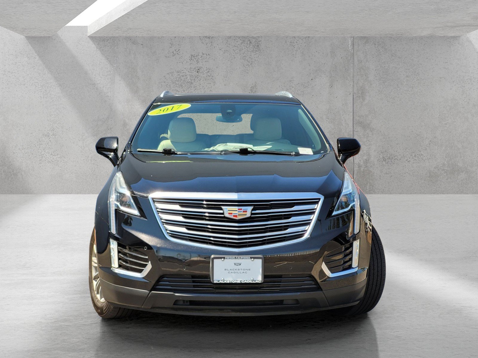 Used 2017 STELLAR BLACK METALLIC Cadillac Luxury FWD image 2