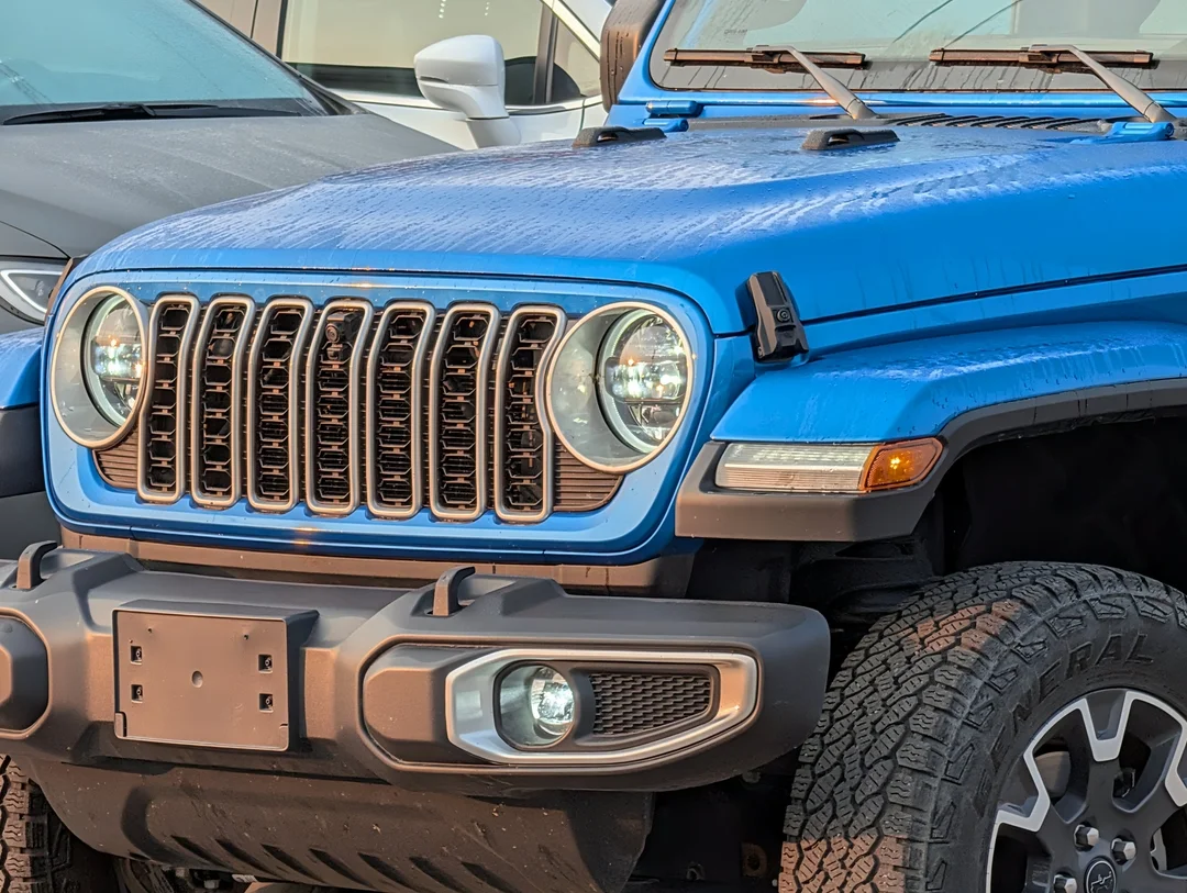 Used 2024 Blue Jeep Sahara - - 4x4 - Leather Seats - Power Soft Top - Remote Start & More! image 10
