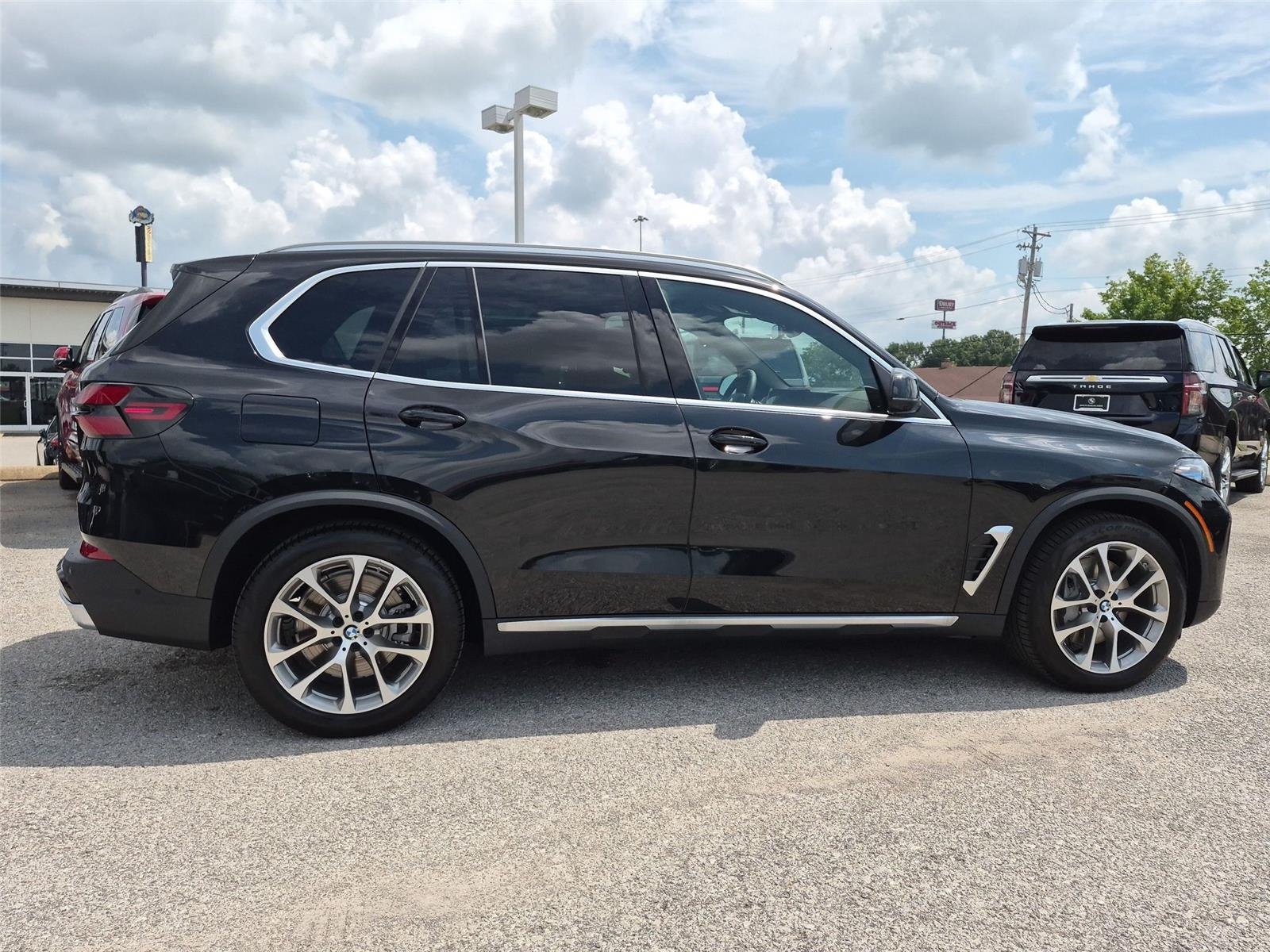 New 2026 Black Sapphire Metallic BMW xDrive50e image 6