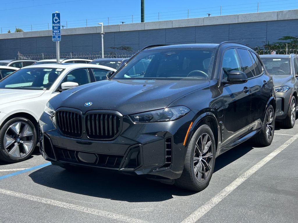 Certified Used 2024 Black Sapphire Metallic BMW xDrive50e image 2