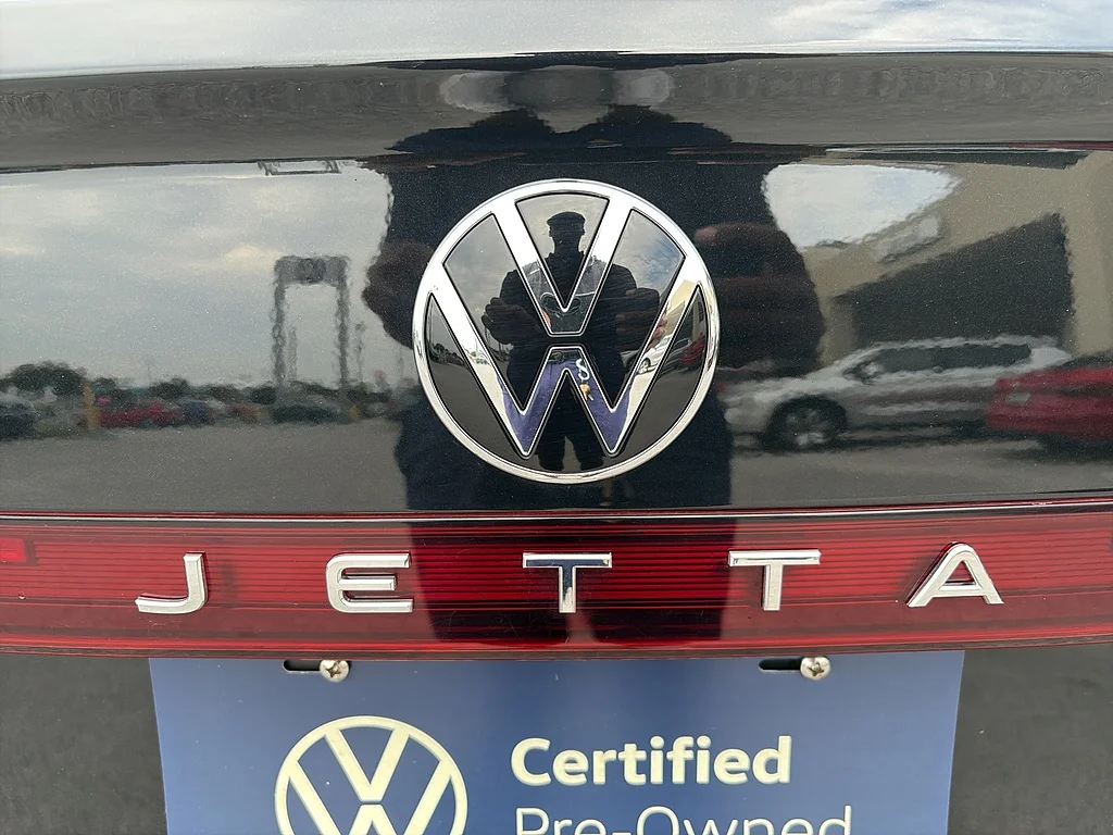 Certified Used 2025 Deep Black Pearl Volkswagen Sport Auto image 12