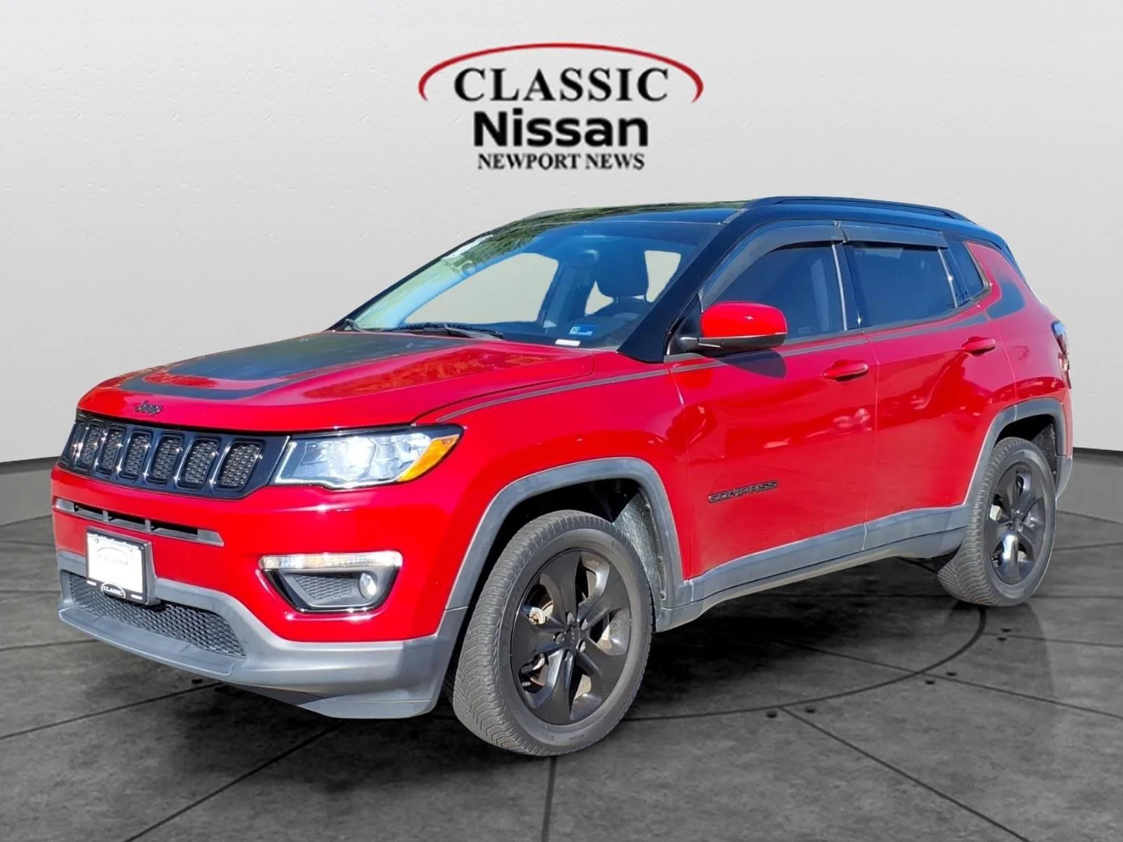 Used 2018 Redline Pearlcoat Jeep Altitude image 1