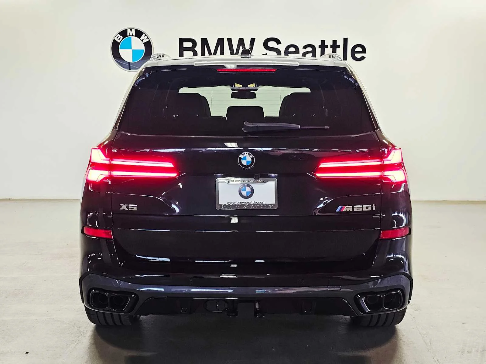 New 2026 Black Sapphire Metallic BMW M60i image 5
