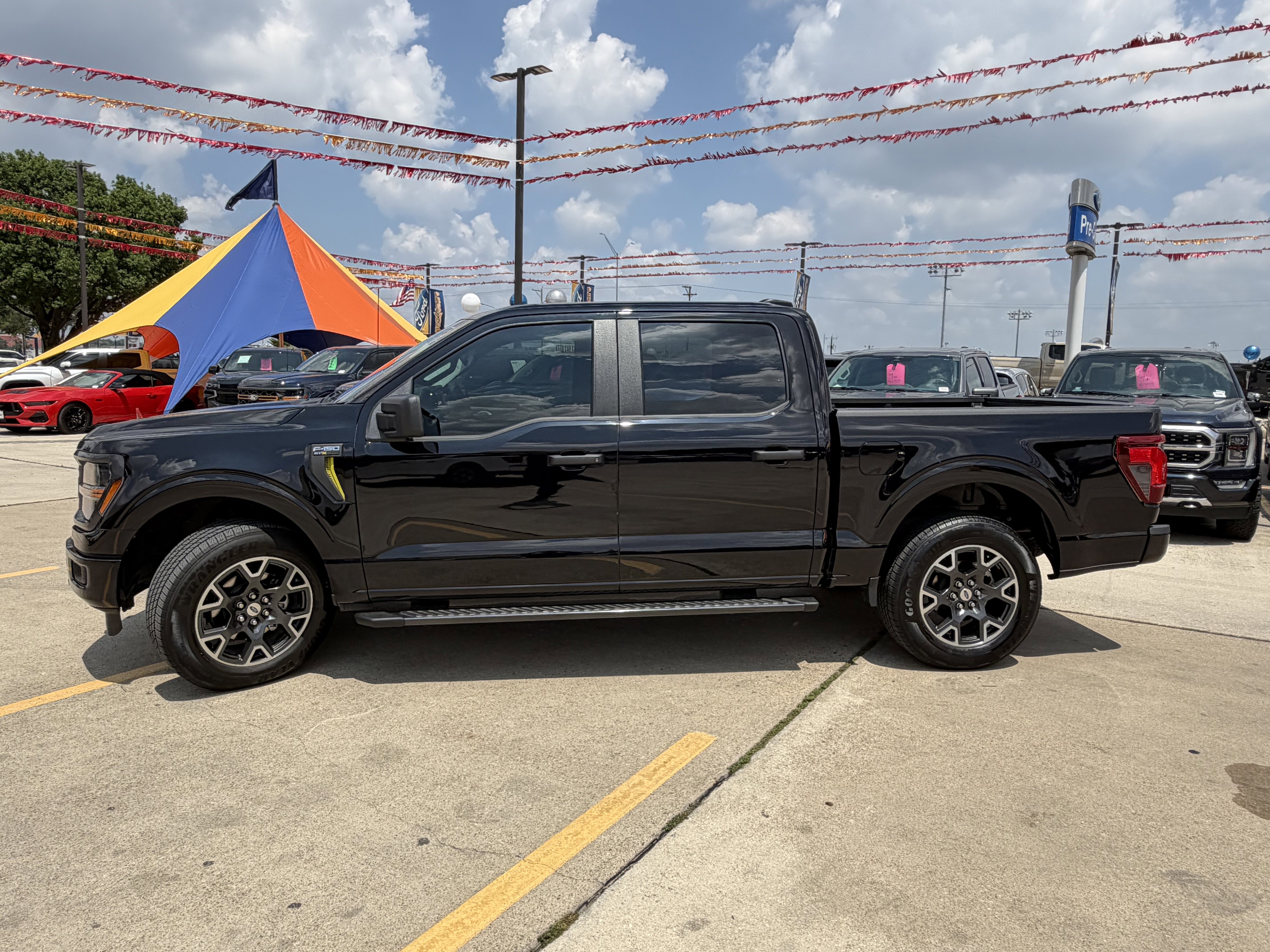 Used 2024 Agate Black Metallic Ford STX image 10
