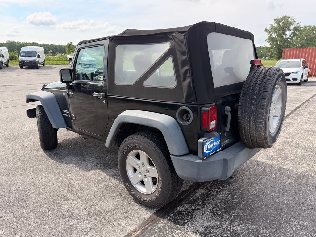 Used 2015 Black Clearcoat Jeep Sport image 4