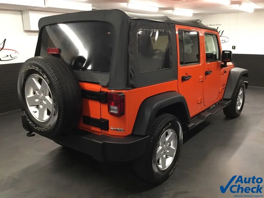 Used 2015 Orange Jeep Unlimited Sport image 11