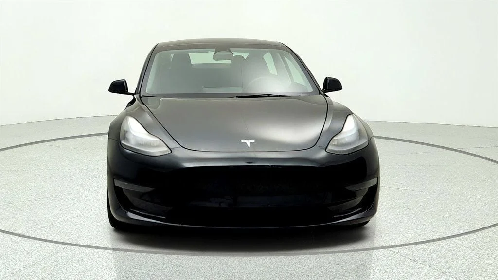 Used 2023 Solid Black Tesla RWD image 2