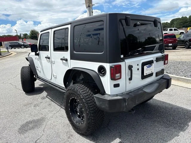 Used 2017 White Jeep Unlimited Sport image 6