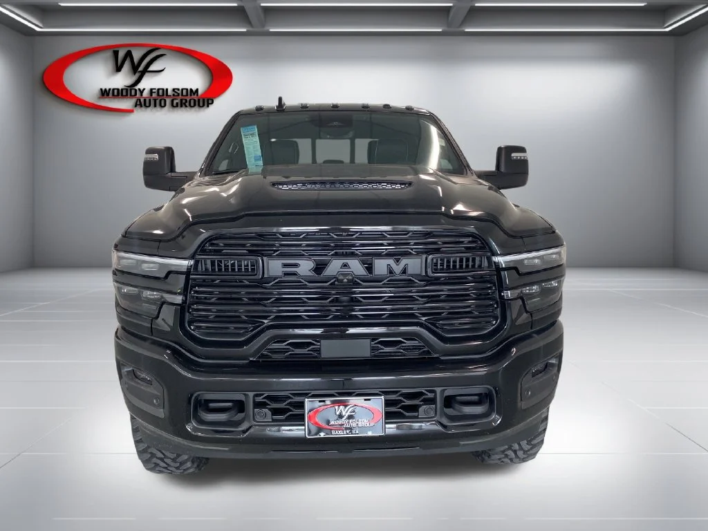 New 2026 Diamond Black Crystal Pearl-Coat Exterior Paint RAM Laramie image 2