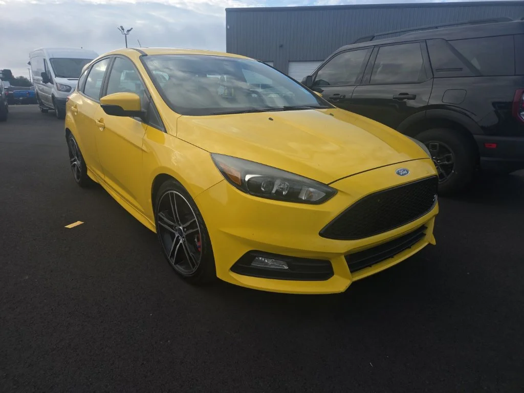 Certified Used 2017 Yellow Ford ST image 1