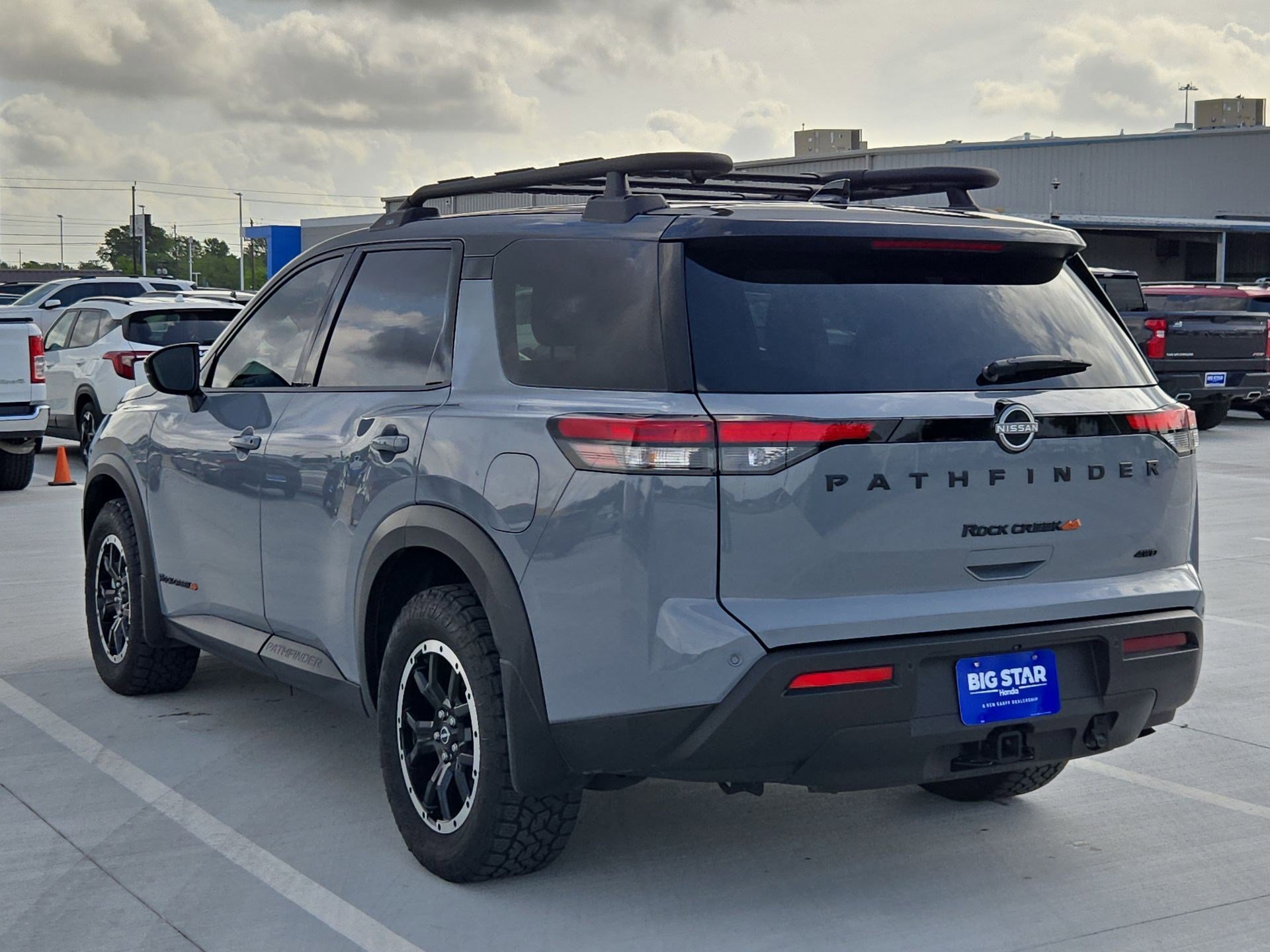 Used 2025 Solid Gray/Super Black Nissan Rock Creek image 5