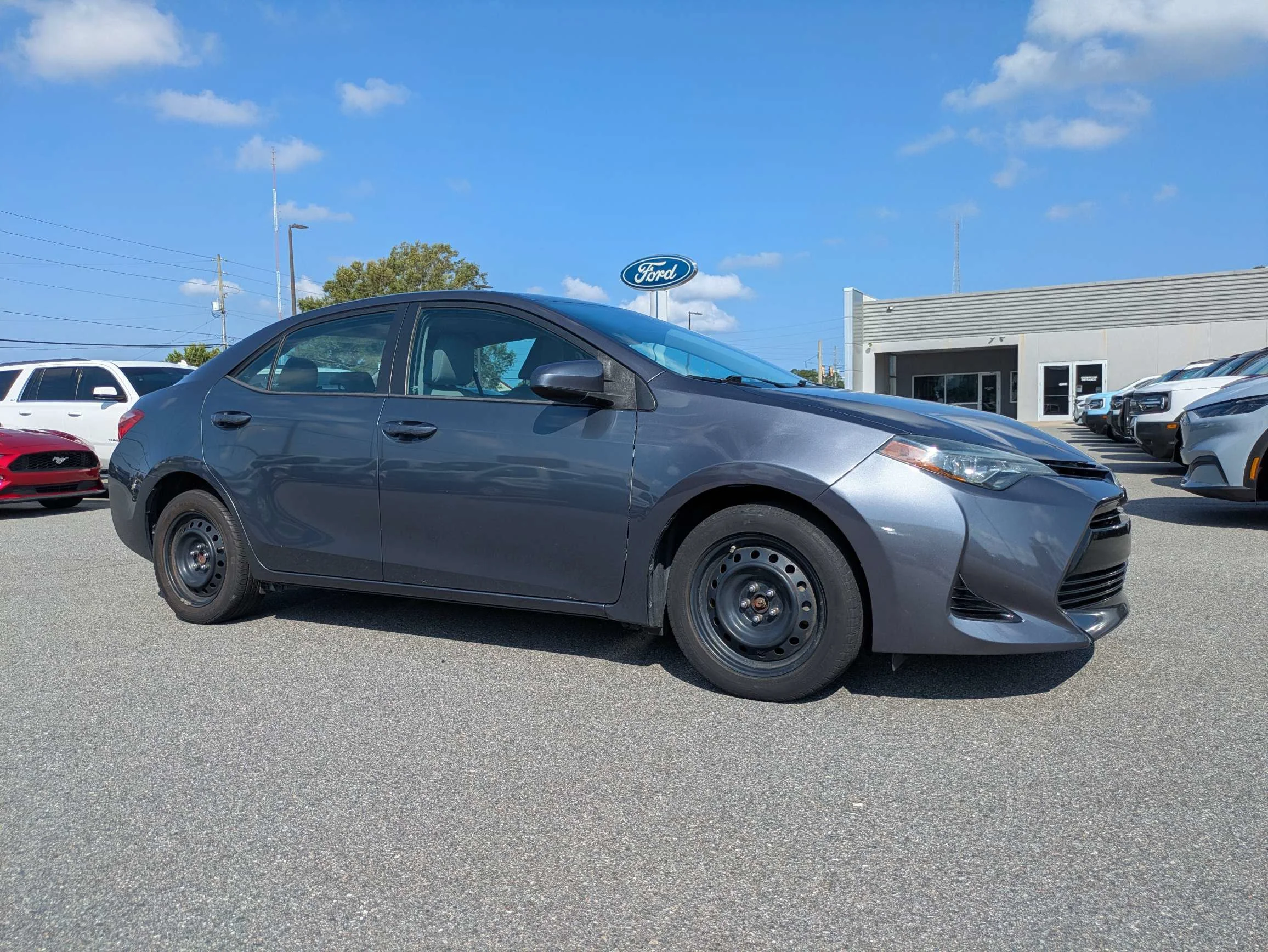Used 2017 Toyota Corolla LE with VIN 5YFBURHE4HP657497 for sale in Brunswick, GA