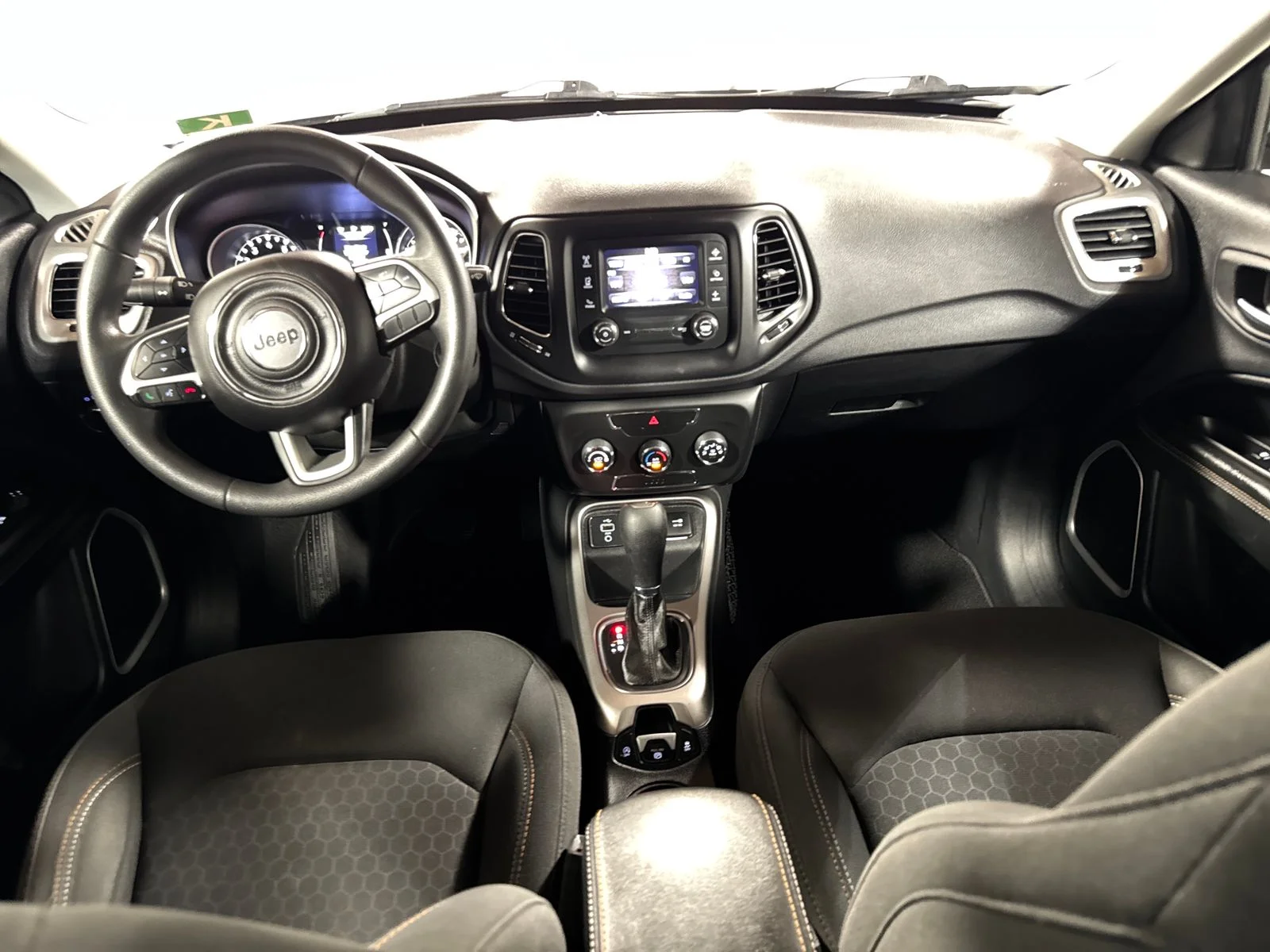 Used 2018 Granite Crystal Metallic Clearcoat Jeep Sport image 4