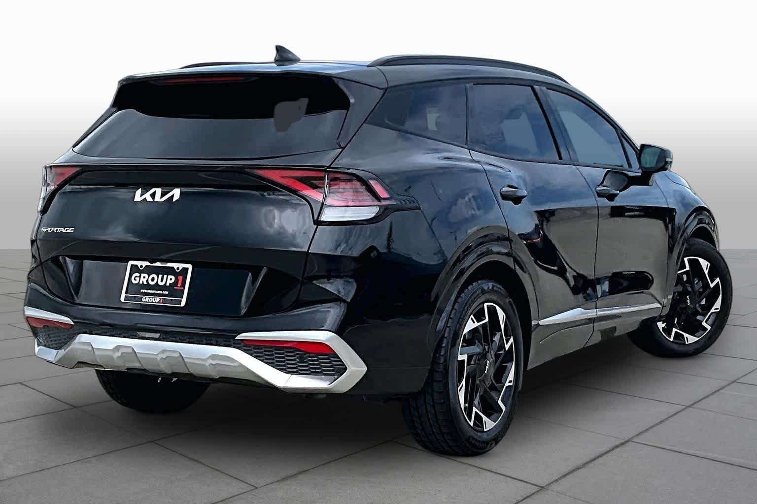 Used 2023 Ebony Black Kia SX-Prestige image 12